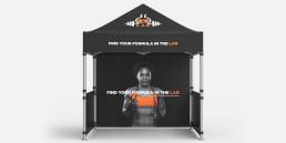 LAB black pull up tent with logo and tagline